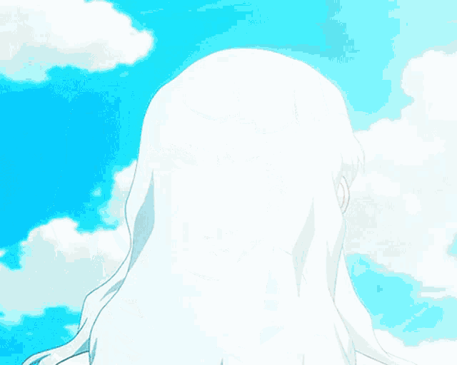 a woman 's head is visible in front of a blue sky with white clouds