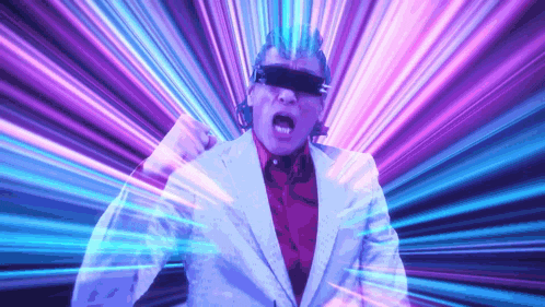 a man in a suit and sunglasses is standing in front of a purple and blue light