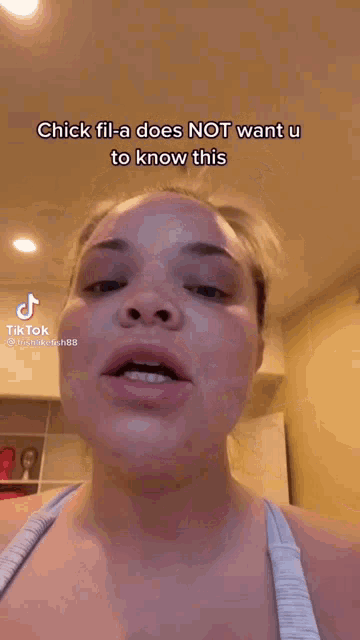 a woman in a blue tank top says chick fil-a does not want you to know this