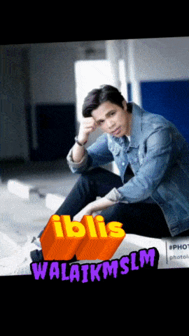 a man in a denim jacket sits on a bench with the words iblis walaikmslm below him