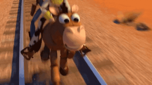 woody is riding on the back of bullseye from toy story .