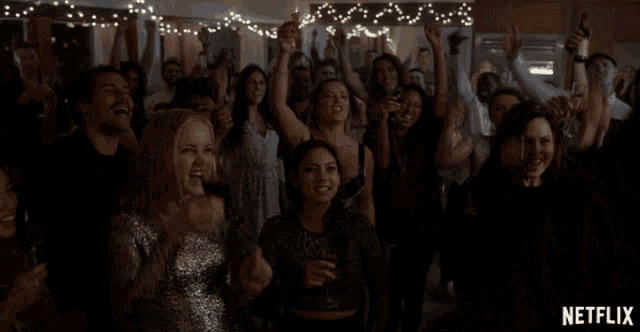 a netflix ad shows a crowd of people dancing at a party