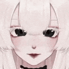 a close up of a girl 's face with a bow tie .