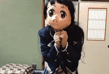 a girl with a mask on her face is standing in a room