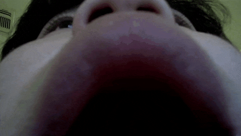 a close up of a person 's face with a very large nose