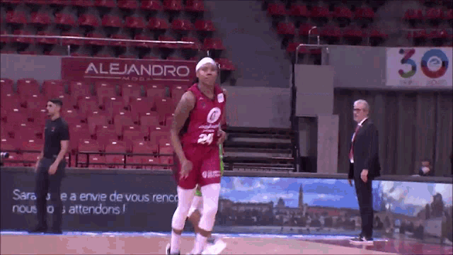 a basketball player wearing a jersey that says alejandro