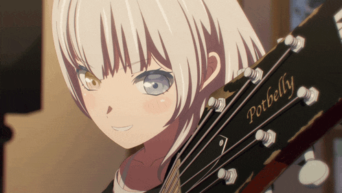 a girl holding a potbelly guitar looks at the camera