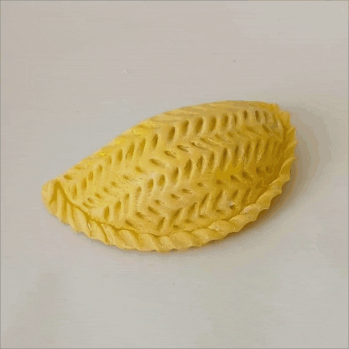 a yellow item with ay boyat sekerbura written on the bottom