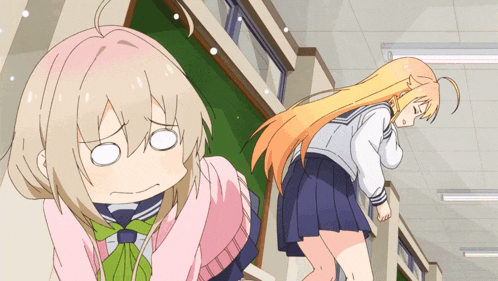 two anime girls are standing next to each other with one making a face