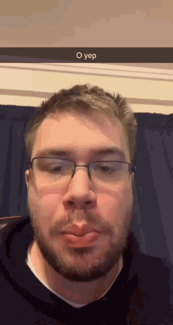 a man with glasses and a beard has a snap that says o yep on the bottom