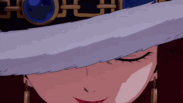 a close up of a woman wearing a hat