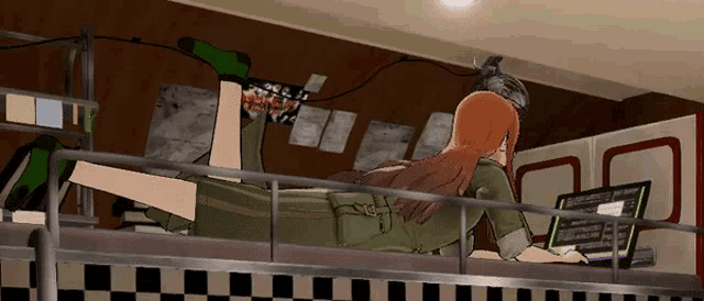 a girl is laying on a balcony with a laptop and a phone