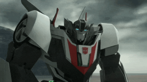 a robot with a red white and black stripe on its chest