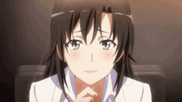 a close up of a girl 's face with her eyes closed