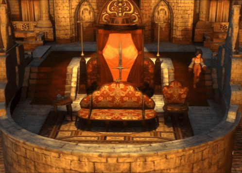 a woman stands in a room with a couch and a canopy bed