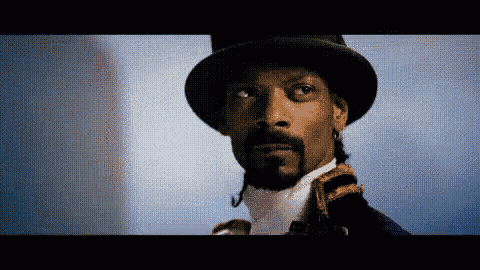 snoop dogg is wearing a top hat and a military uniform