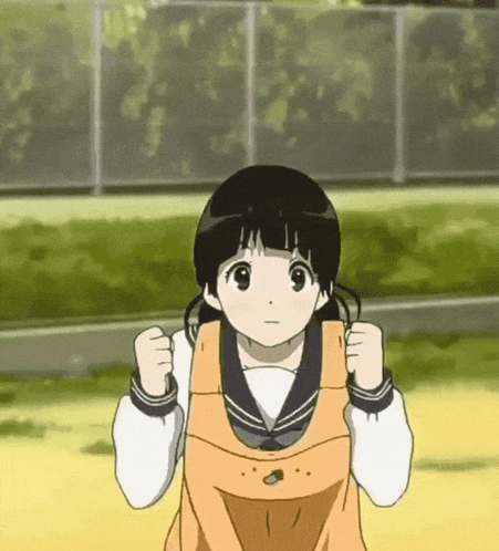 a girl with black hair is wearing an orange apron and a sailor uniform