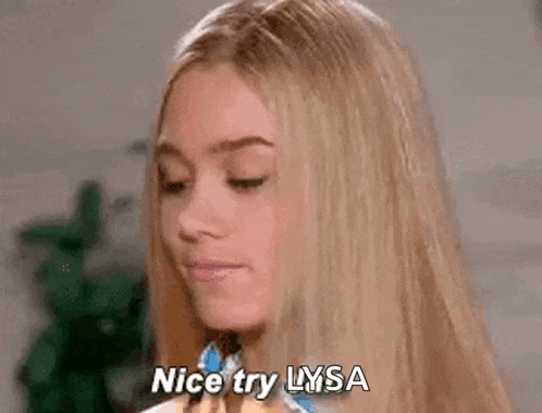 a young woman with long blonde hair is looking down and saying `` nice try lysa '' .
