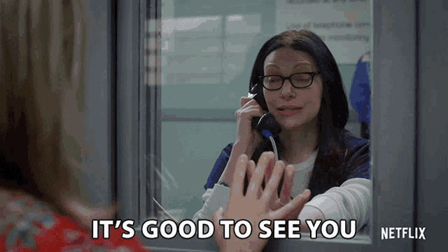 a netflix advertisement shows a woman talking on a cell phone