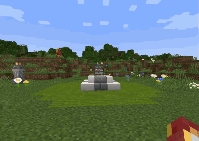 a cemetery in minecraft with a statue of a lion