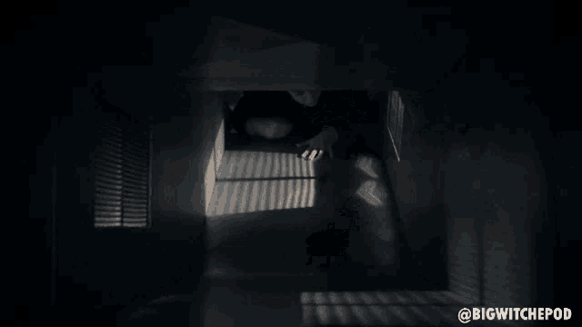 a man in a suit is crawling out of a dark room with the words bigwitchepod on the bottom right