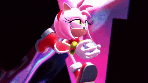 amy rose from sonic the hedgehog is holding a ball in her hand