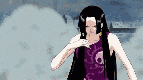 a woman with long black hair is standing in front of a cloud of smoke in a purple dress .