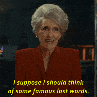 an elderly woman in a red suit says i suppose i should think of some famous last words