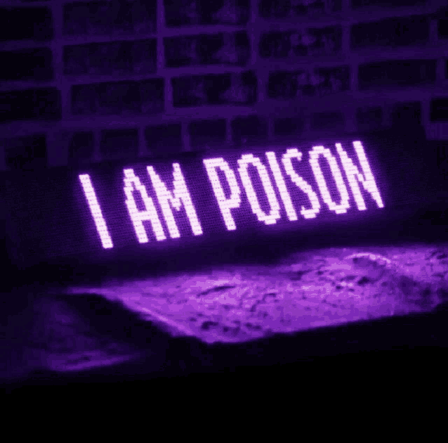 a purple sign that says " i am poison "