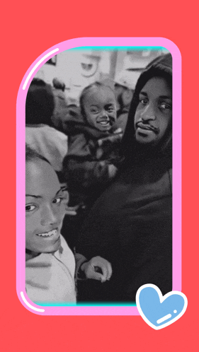 a black and white photo of a man and two children