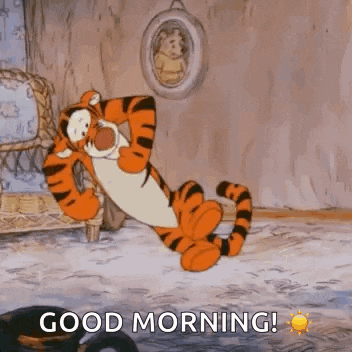 tigger from winnie the pooh is laying on the floor in a room and saying good morning .