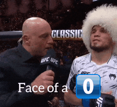 a man talking into a microphone that says ufc ufc on it