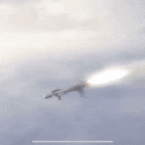 a person is standing in front of an explosion with a white background