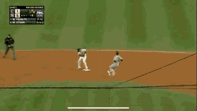 a baseball game is being played between the yankees and the rays