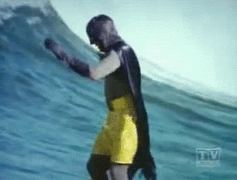 Batman Surfing GIF - Batman Surfing Yellow Short GIFs
