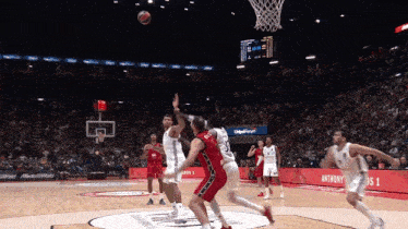 a basketball game is being played in a stadium with anthony 's name on the side