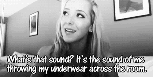 a woman is talking about throwing her underwear across the room in a black and white photo .
