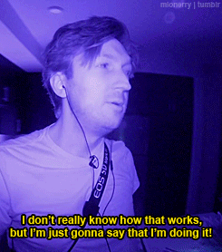 a man wearing eos camera strap says i do n't really know