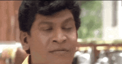 a close up of a man with his eyes closed .