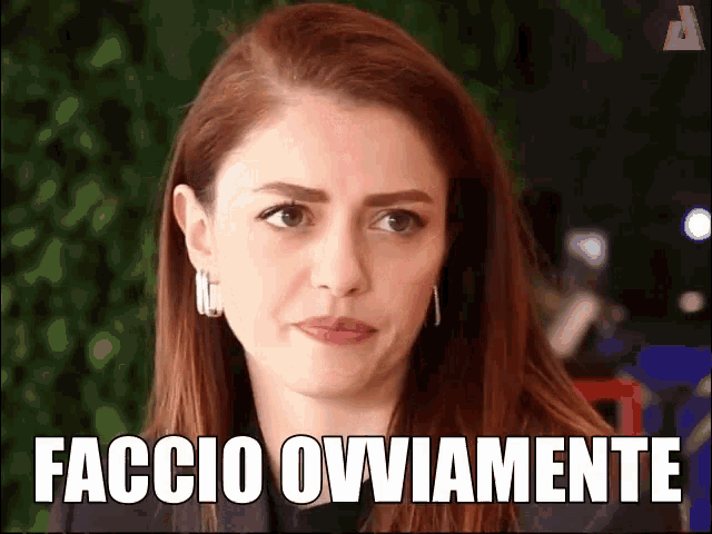 a woman with a serious look on her face and the words faccio ovviamente written below her