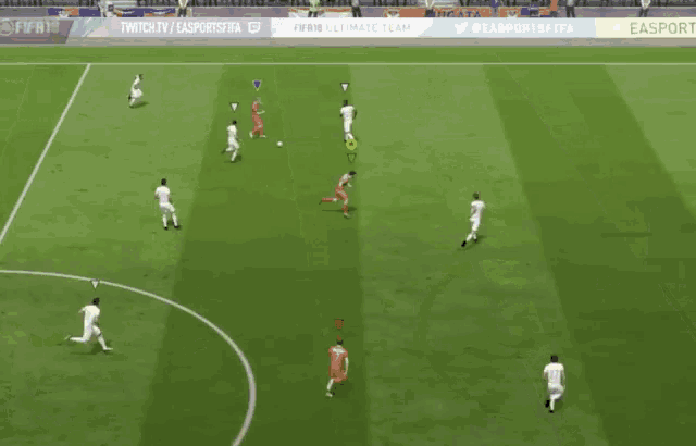 a soccer game is being played on a field sponsored by ea sports