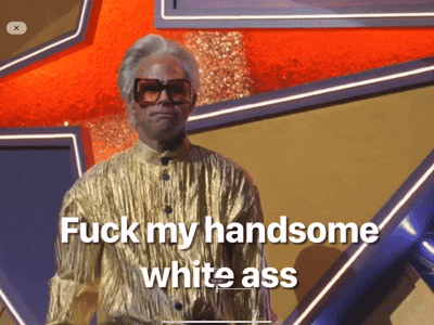 a man in a gold shirt says fuck my handsome white ass on the screen