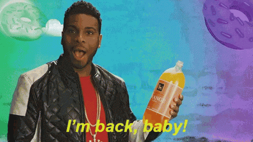 a man is holding a bottle of orange juice and saying i 'm back baby