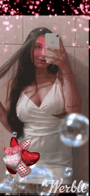 a woman in a white dress is taking a picture of herself with her phone
