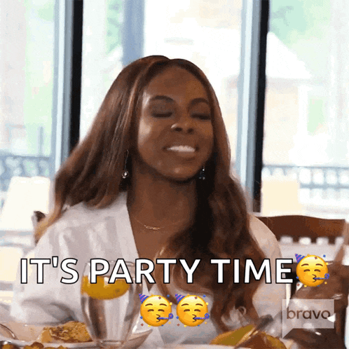 a woman says it 's party time while eating