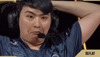 a man wearing headphones and a microphone with the word replay on the bottom right