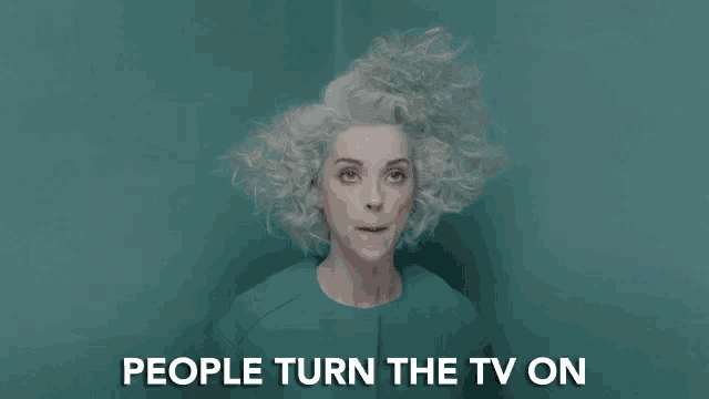 a woman making a face with the words people turn the tv on in the background
