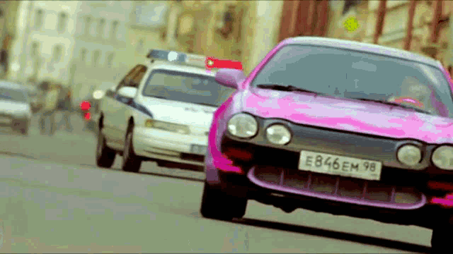 a pink car with a license plate that says e846em98