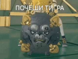 a cartoon dog with gold gloves and a crown on its head is standing on a green floor .