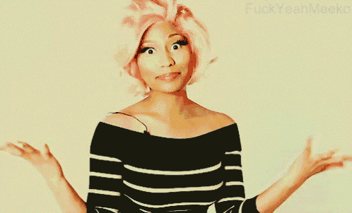 a woman with pink hair is wearing a black and white striped shirt and has her arms outstretched